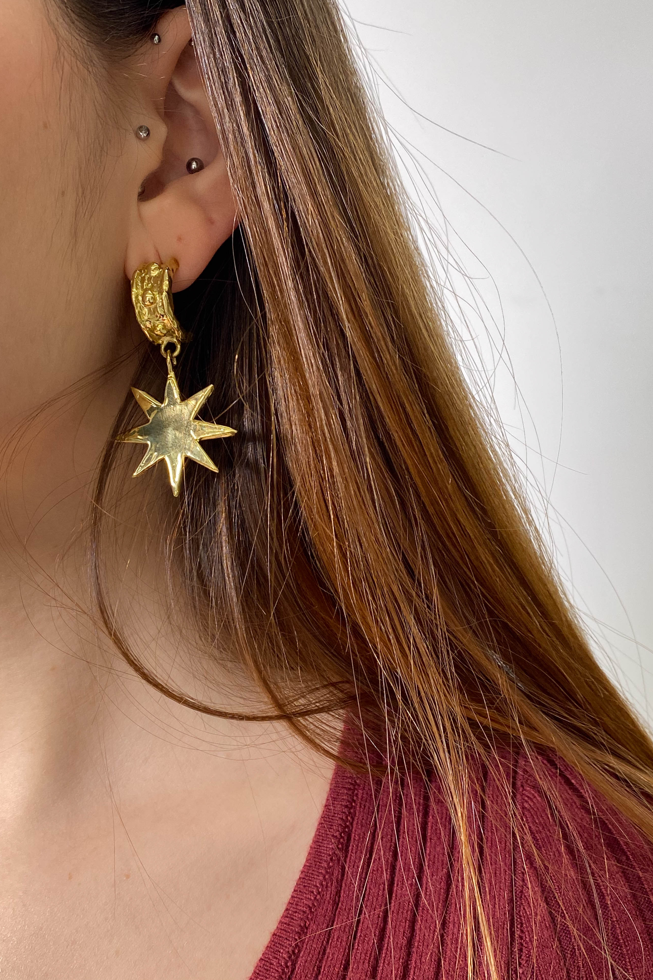brass demi hoop earrings with dangling star