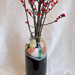 tall vase with expressive strokes of colour pattern