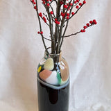 tall vase with expressive strokes of colour pattern