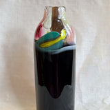 tall vase with expressive strokes of colour pattern