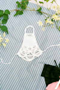 APRON WITH LACE APPLIQUÉ, HANDS IN METALLIC SILVER