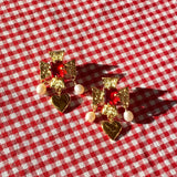 plated brass cross earrings with heart pearl drop