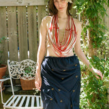 DRAPED BEADED BELT IN WHITE ON RED