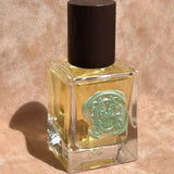 yellow perfume clear glass bottle wax stamped