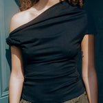 black cupro fitted off shoulder twist top