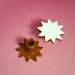 handmade star shaped glazed ceramic candleholders in brown