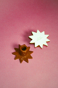 handmade star shaped glazed ceramic candleholders in brown