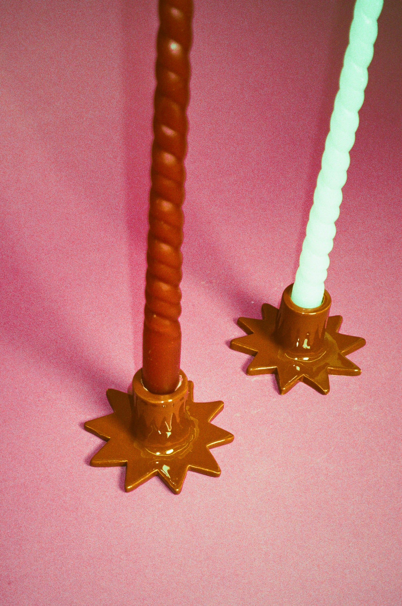 handmade star shaped glazed ceramic candleholders in brown