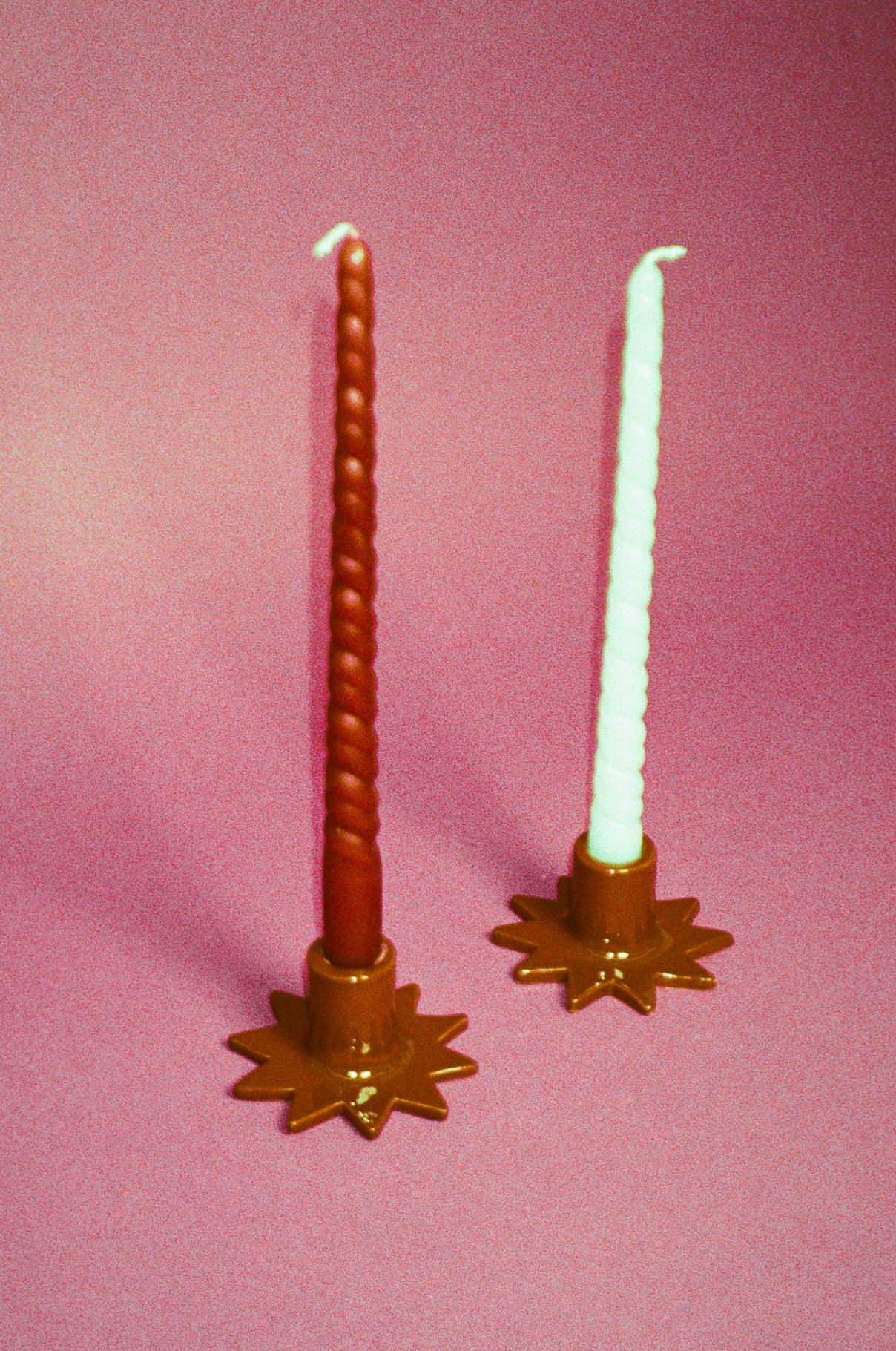handmade star shaped glazed ceramic candleholders in brown