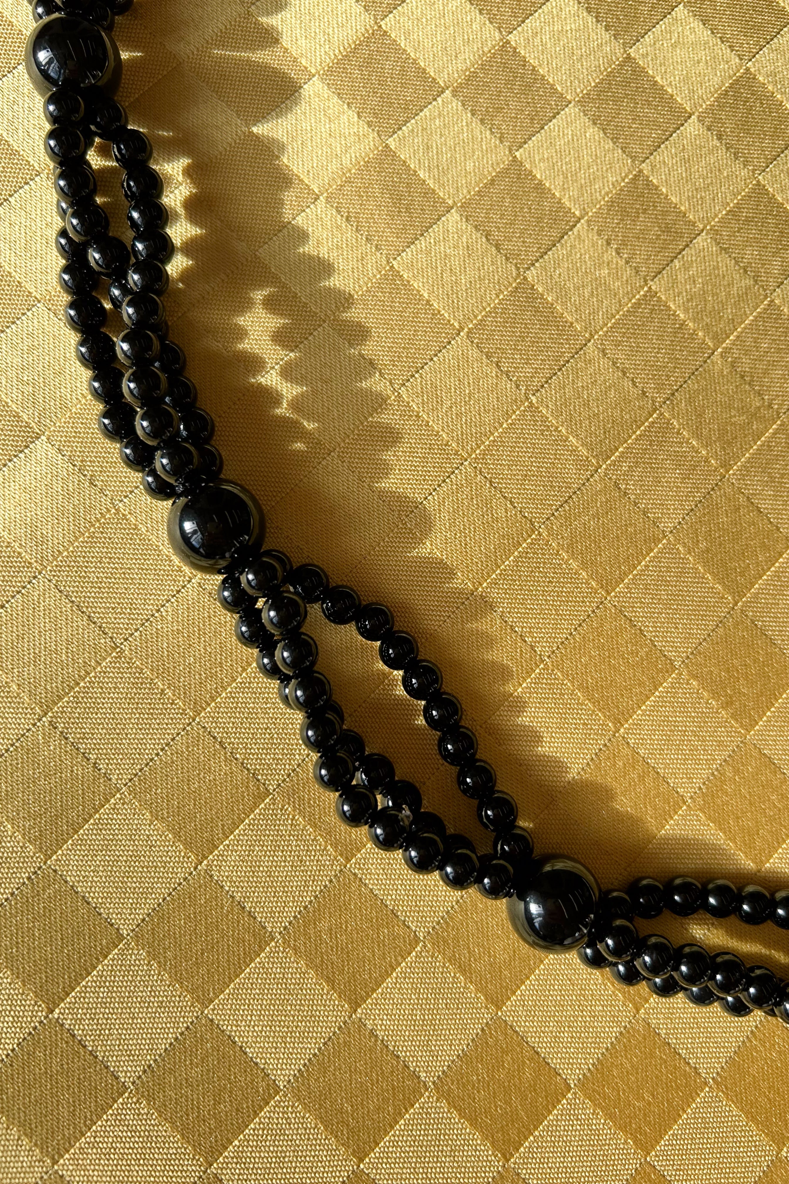 onyx gemstone circular knotted long tassel necklace