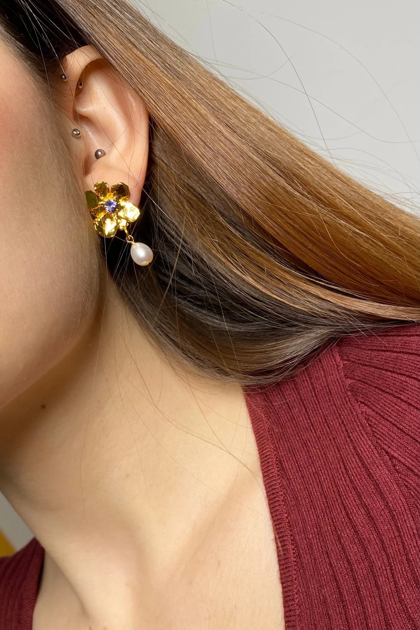 Gold plated flower earrings with violet stone pearl