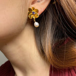 Gold plated flower earrings with violet stone pearl