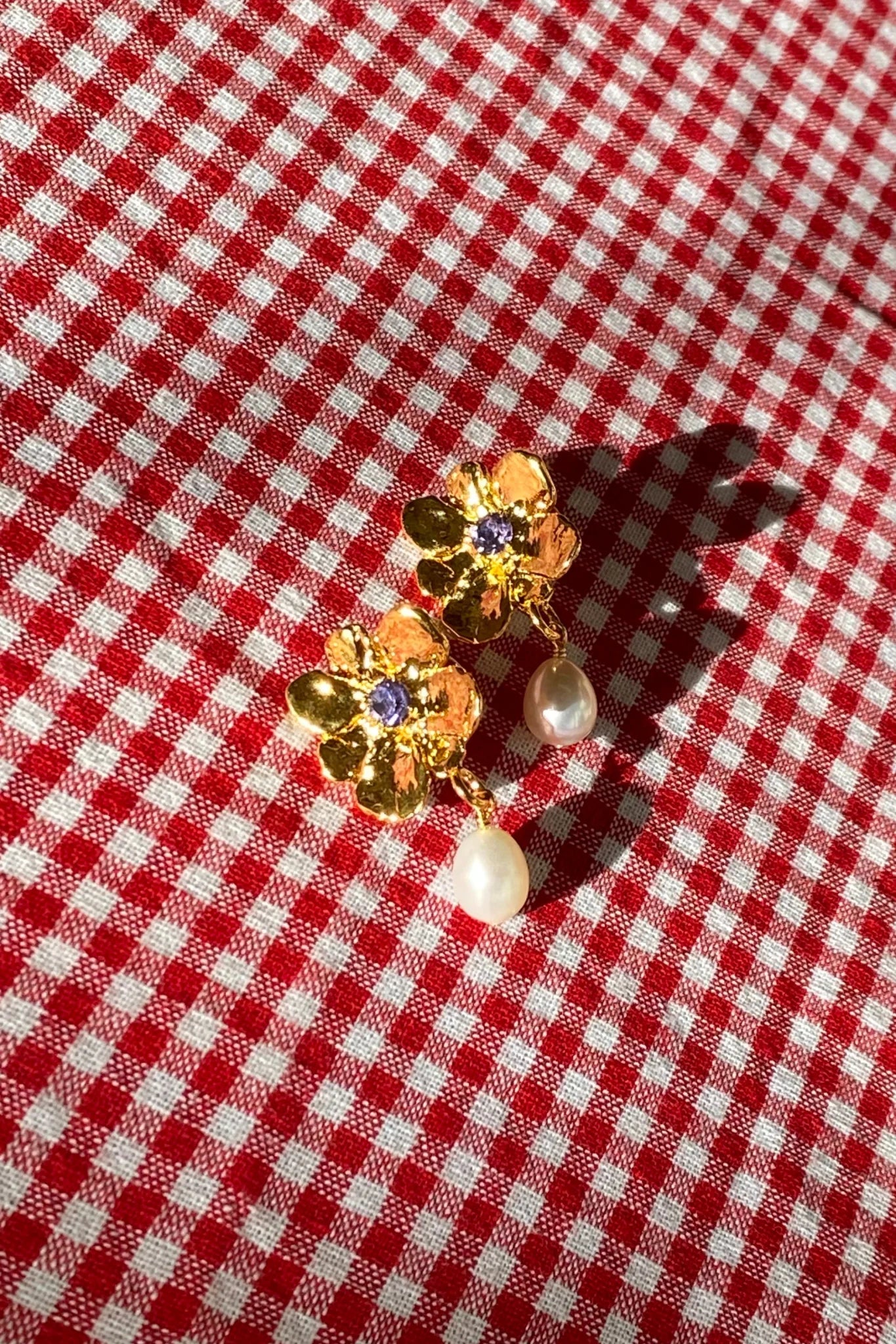 Gold plated flower earrings with violet stone pearl