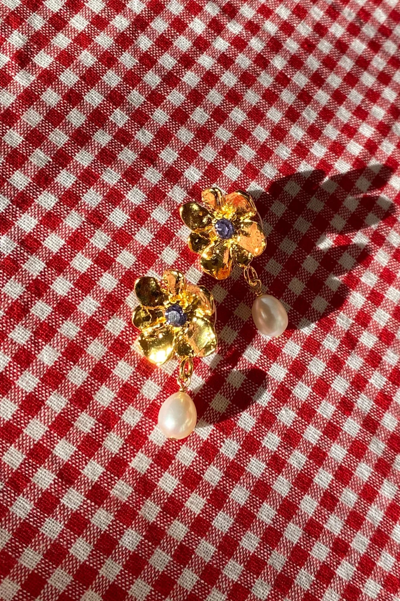 Gold plated flower earrings with violet stone pearl