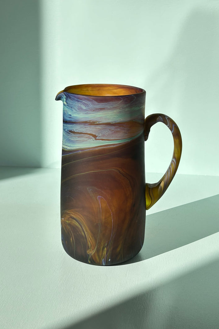 GLASS PITCHER IN AMBER