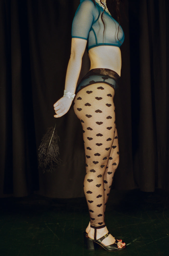 fitted black heart mesh stirrup legging