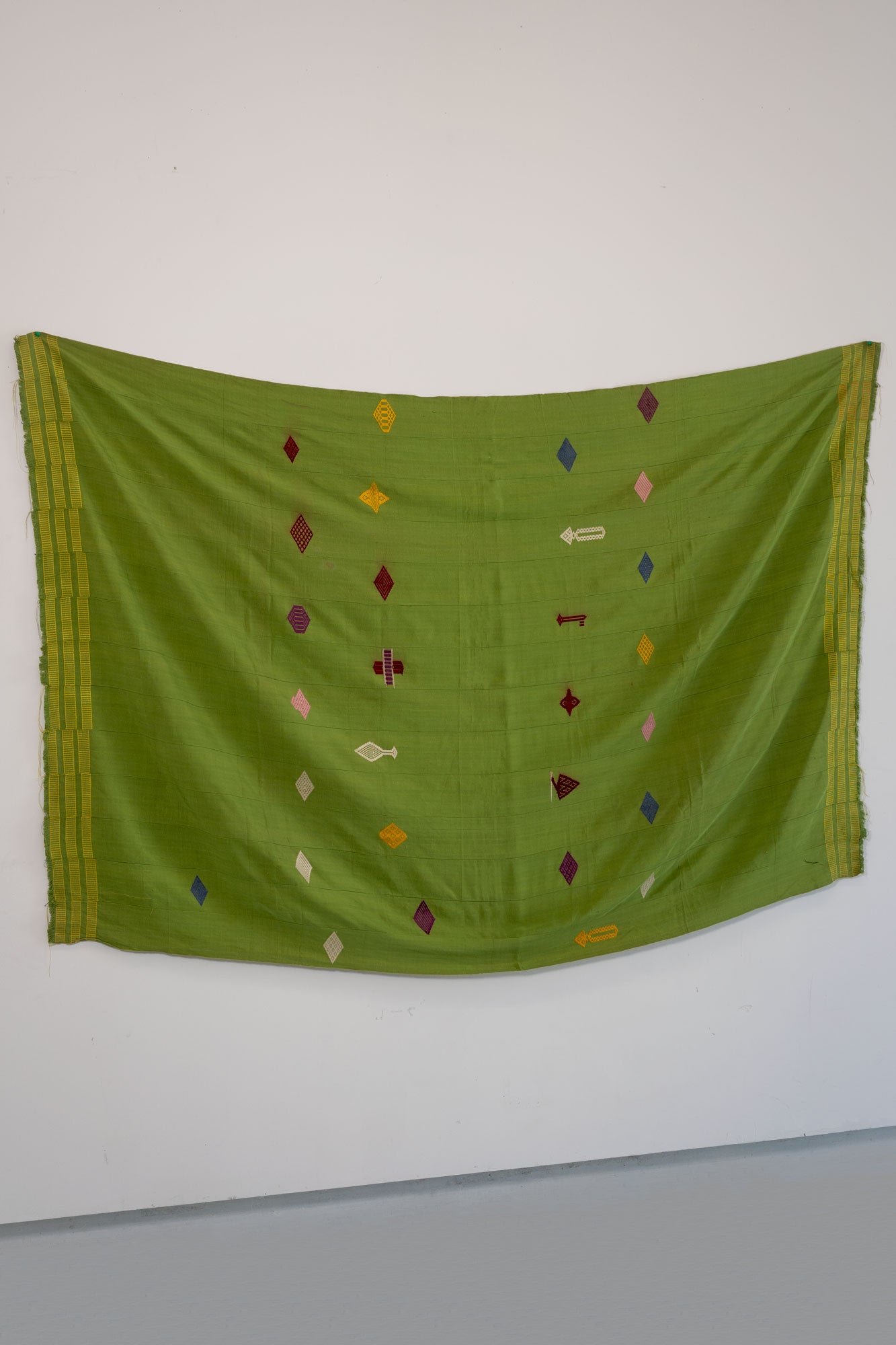 VINTAGE EWE KENTE IN GREEN WITH PINK/MAROON/YELLOW SYMBOLS