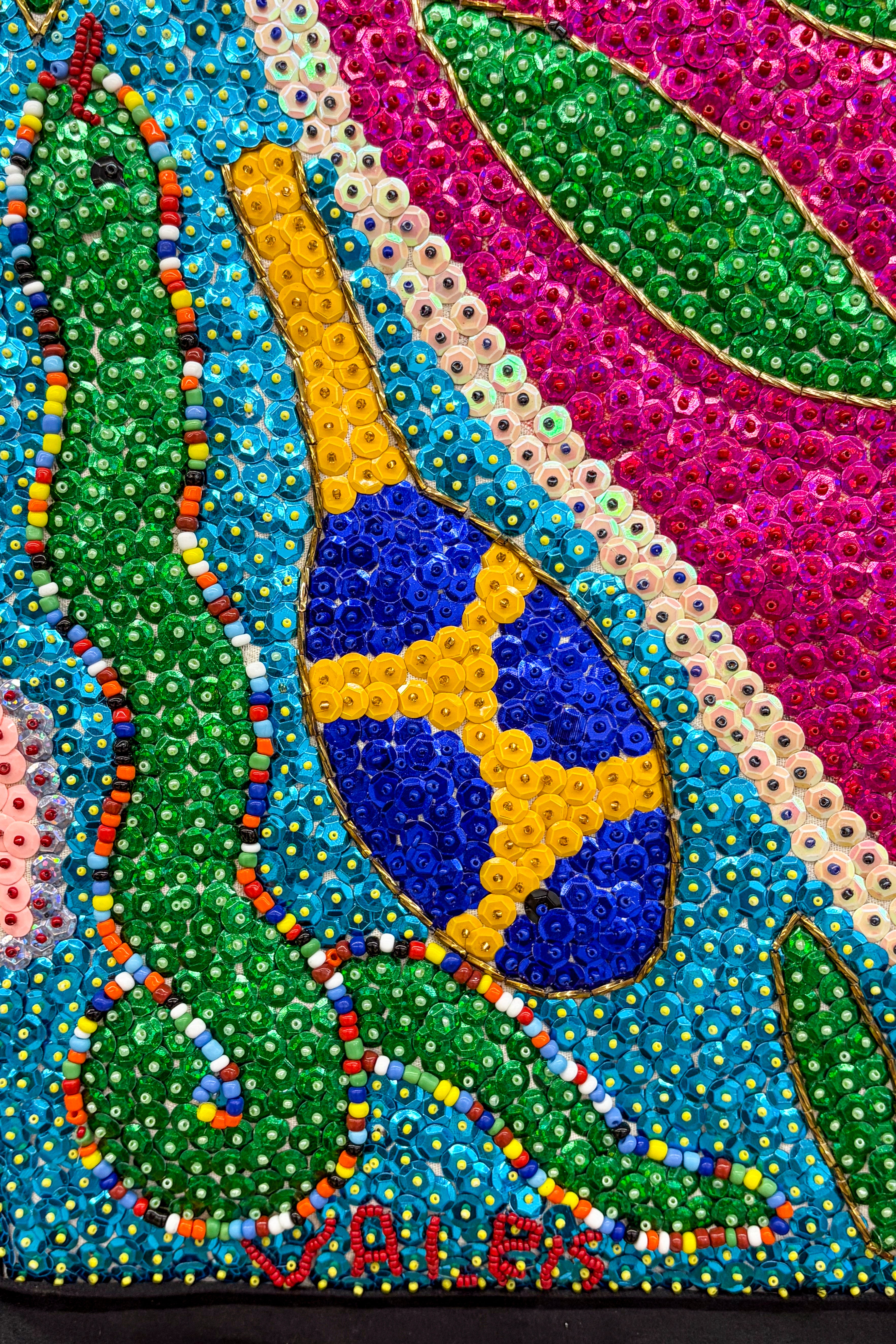 hand beaded sequinned heart and snake drapeau