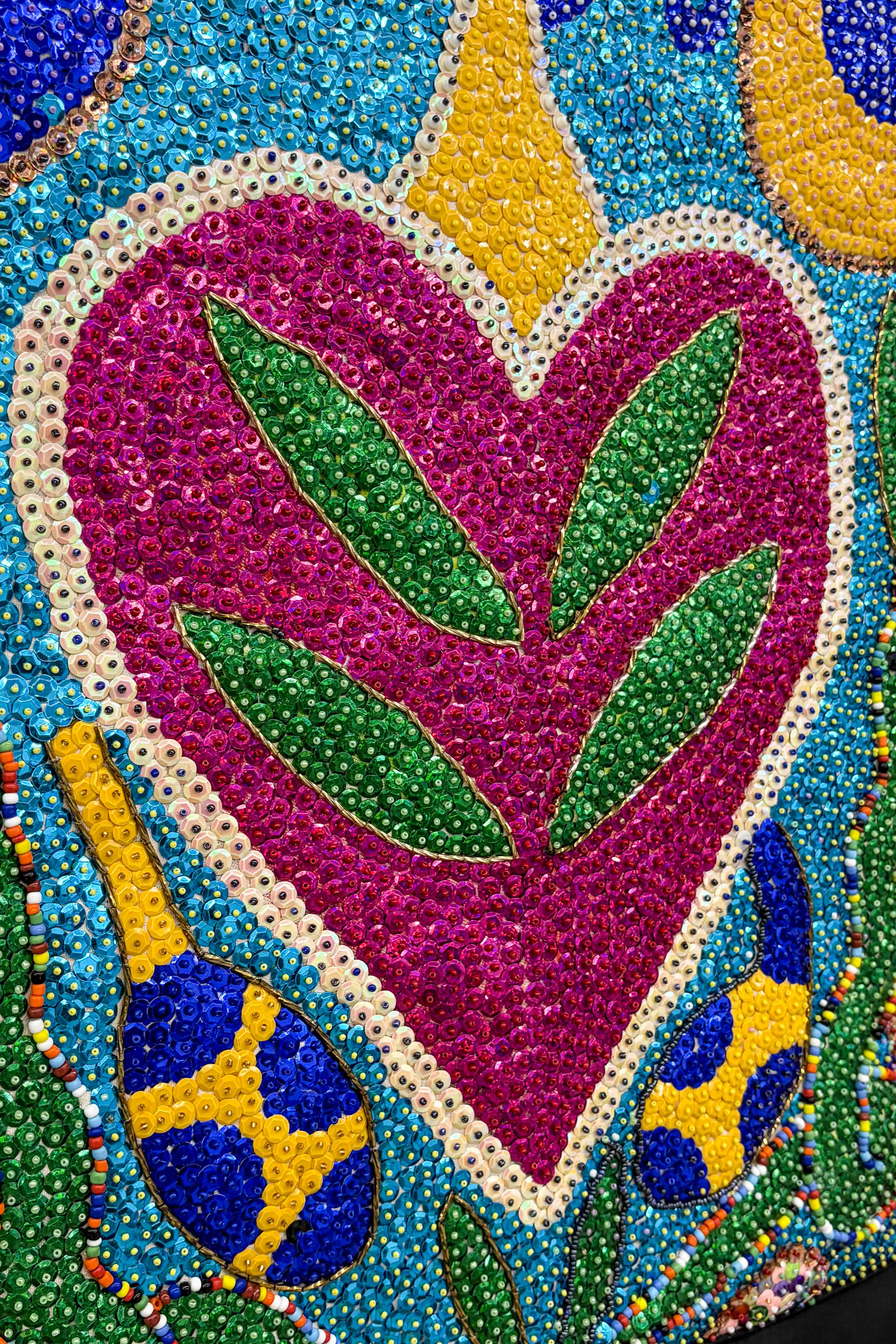 hand beaded sequinned heart and snake drapeau