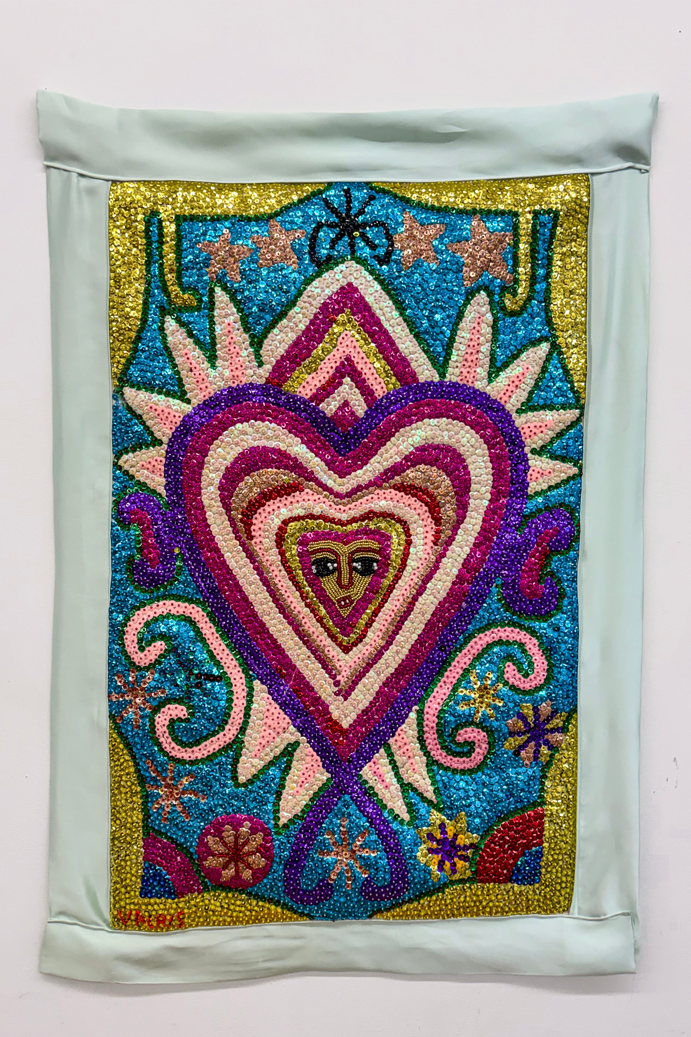 hand beaded sequinned heart with feminine spirit drapeau