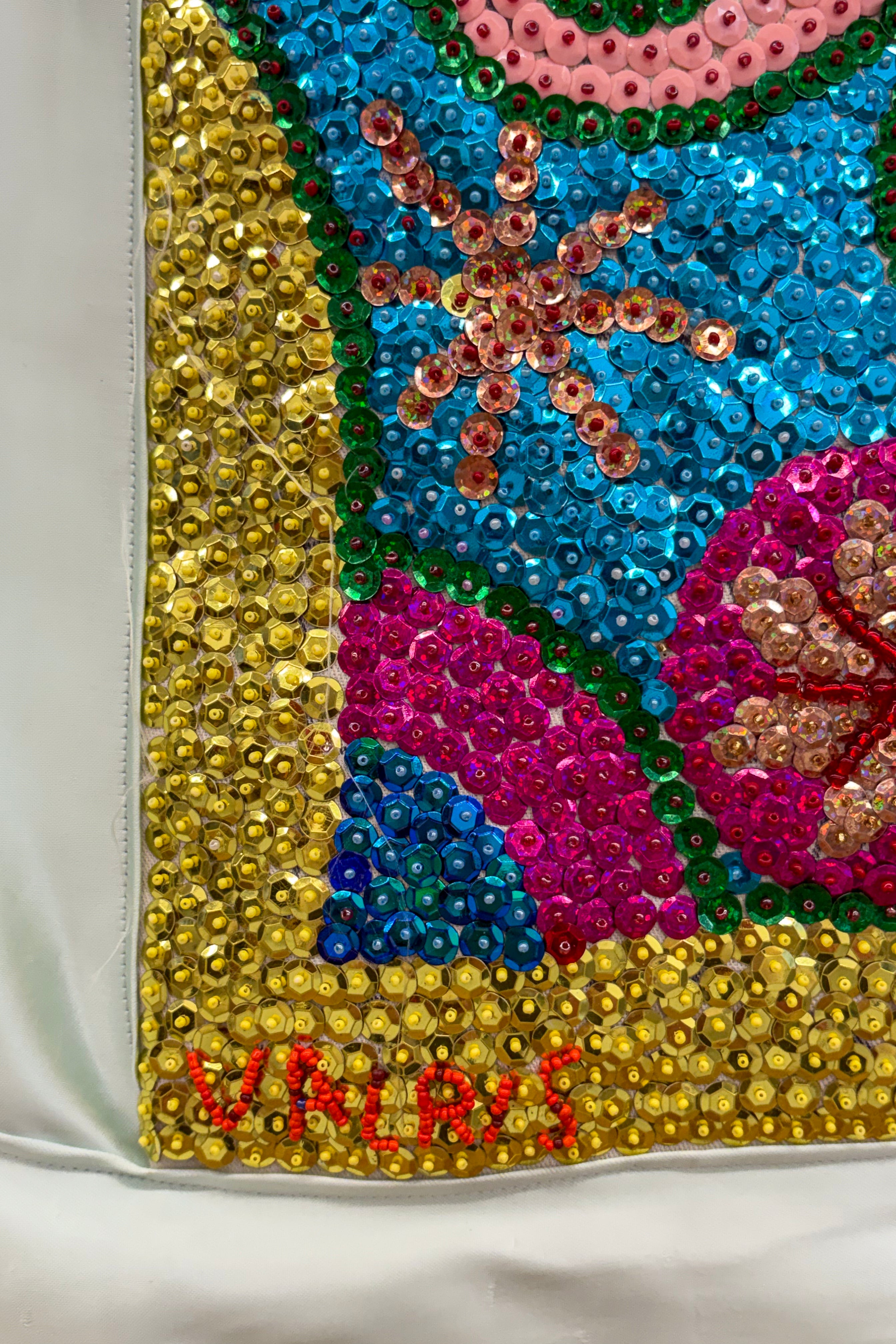 hand beaded sequinned heart with feminine spirit drapeau