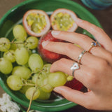 heart shaped silver ring with engraved ruby star