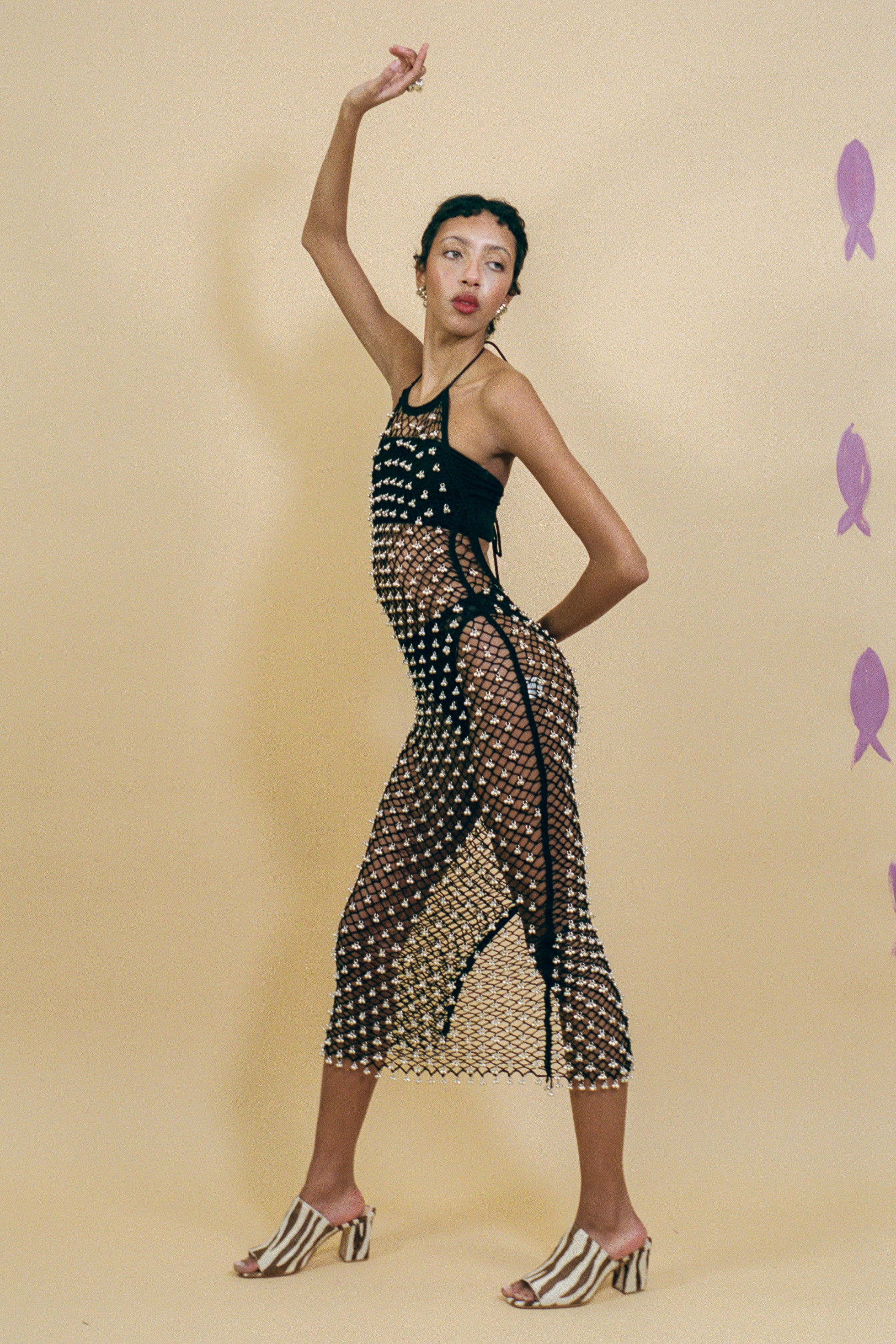 black cotton crochet halter dress with beaded bells