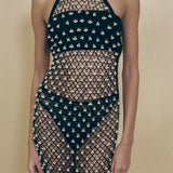 black cotton crochet halter dress with beaded bells