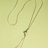 LAZO NECKLACE IN CLEAR/GRENAT