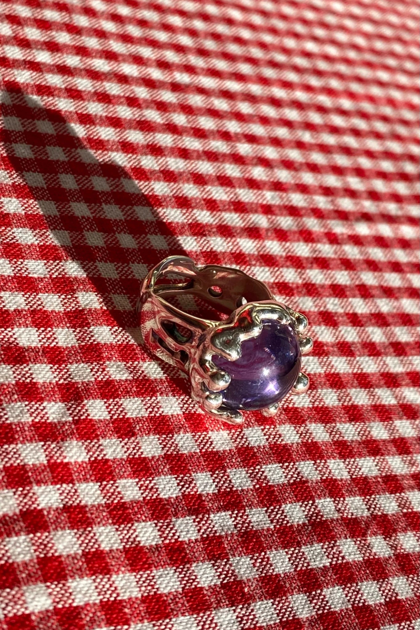 sterling silver textured ring with large purple stone