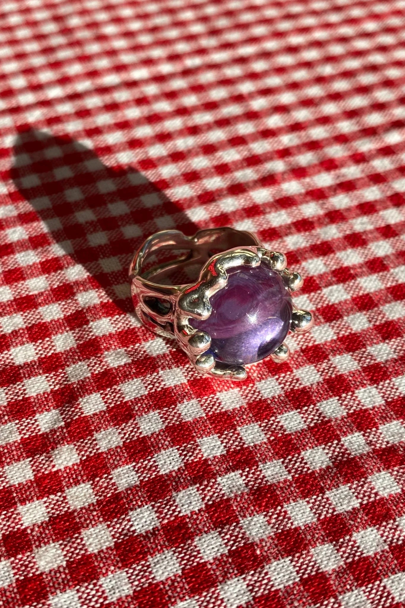 sterling silver textured ring with large purple stone
