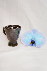 handmade ceramic mug in blue and black glaze
