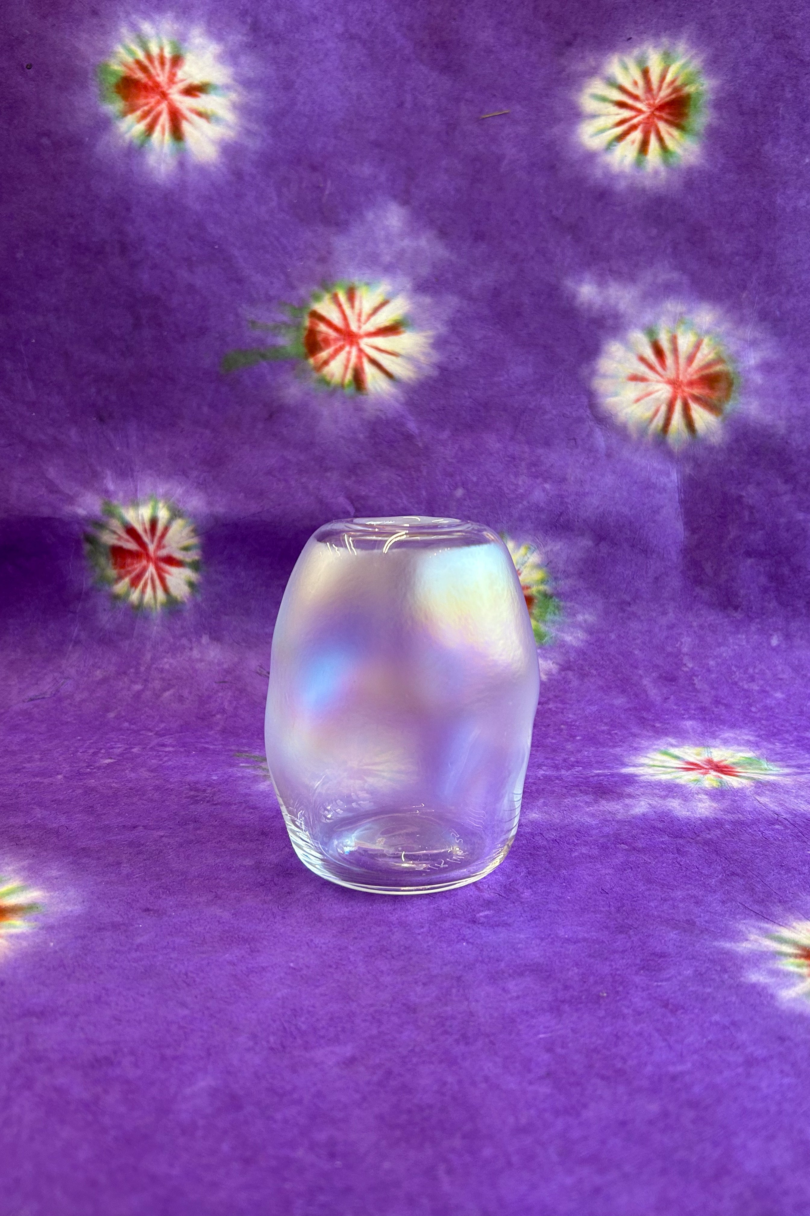 small iridescent sculptured handblown glass vase