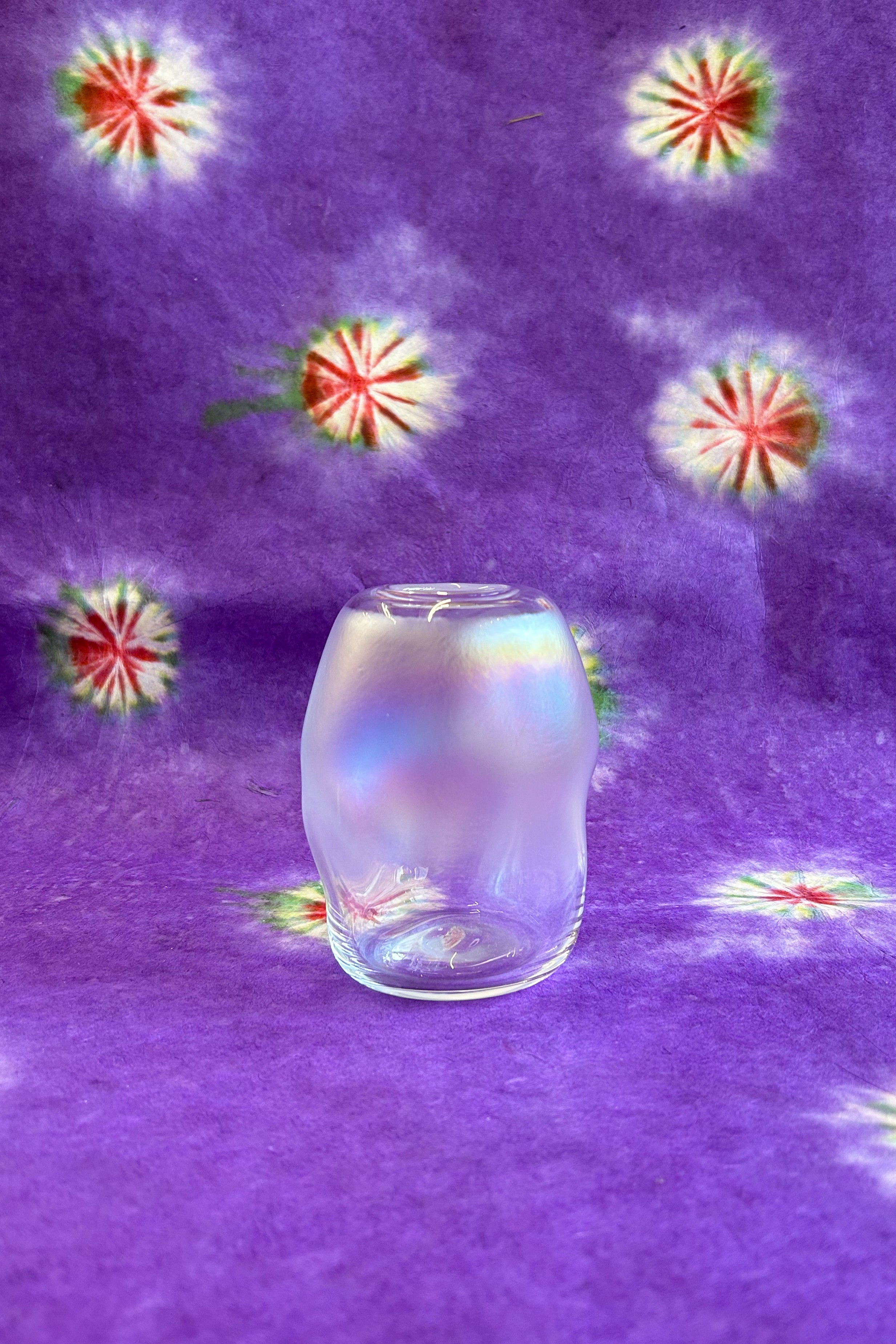 small iridescent sculptured handblown glass vase