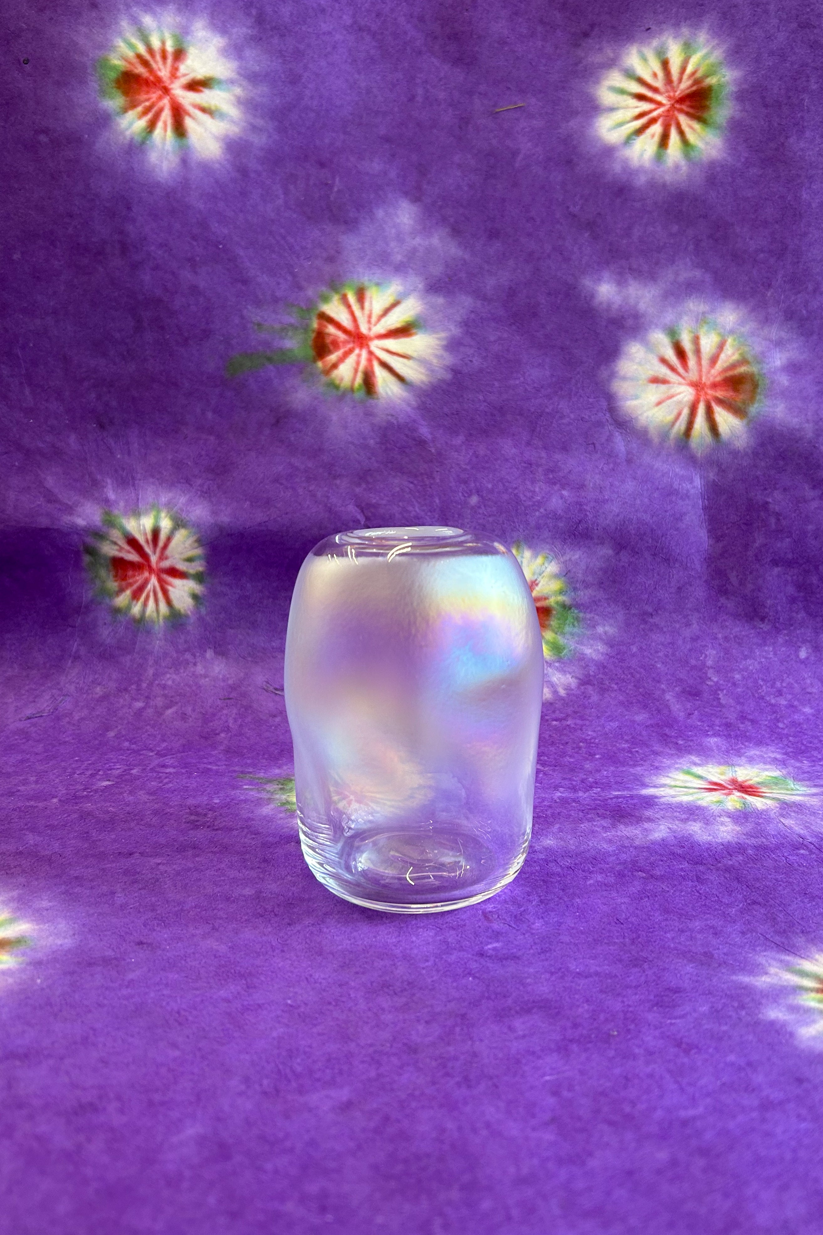 small iridescent sculptured handblown glass vase