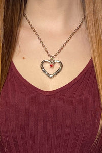 Silver heart necklace with a romantic red crystal