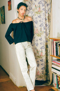 white cotton green ink splatter stove pipe jeans