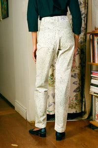white cotton green ink splatter stove pipe jeans
