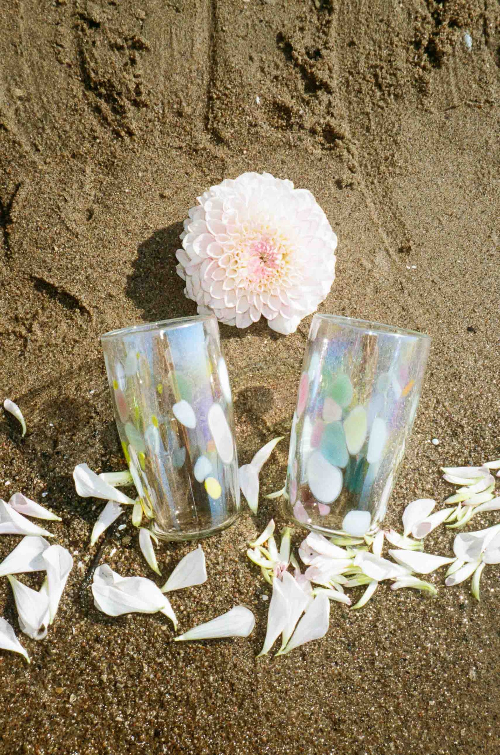 iridescent multi coloured spotted hand blown tumbler glass