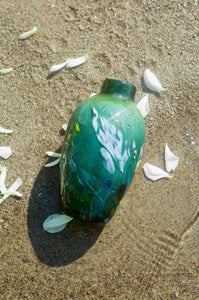 green sparkle speckled hand blown glass vase