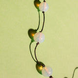 NOUÉ NECKLACE IN OPALINE BLUE MARBLED/BLACK