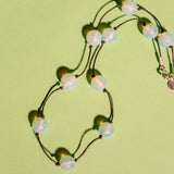 NOUÉ NECKLACE IN OPALINE BLUE MARBLED/BLACK