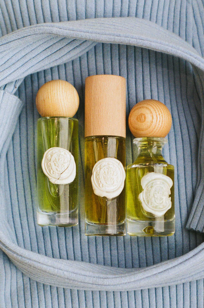 wax stamped vintage glass bottled green perfume