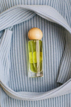 Load image into Gallery viewer, wax stamped vintage glass bottled green perfume