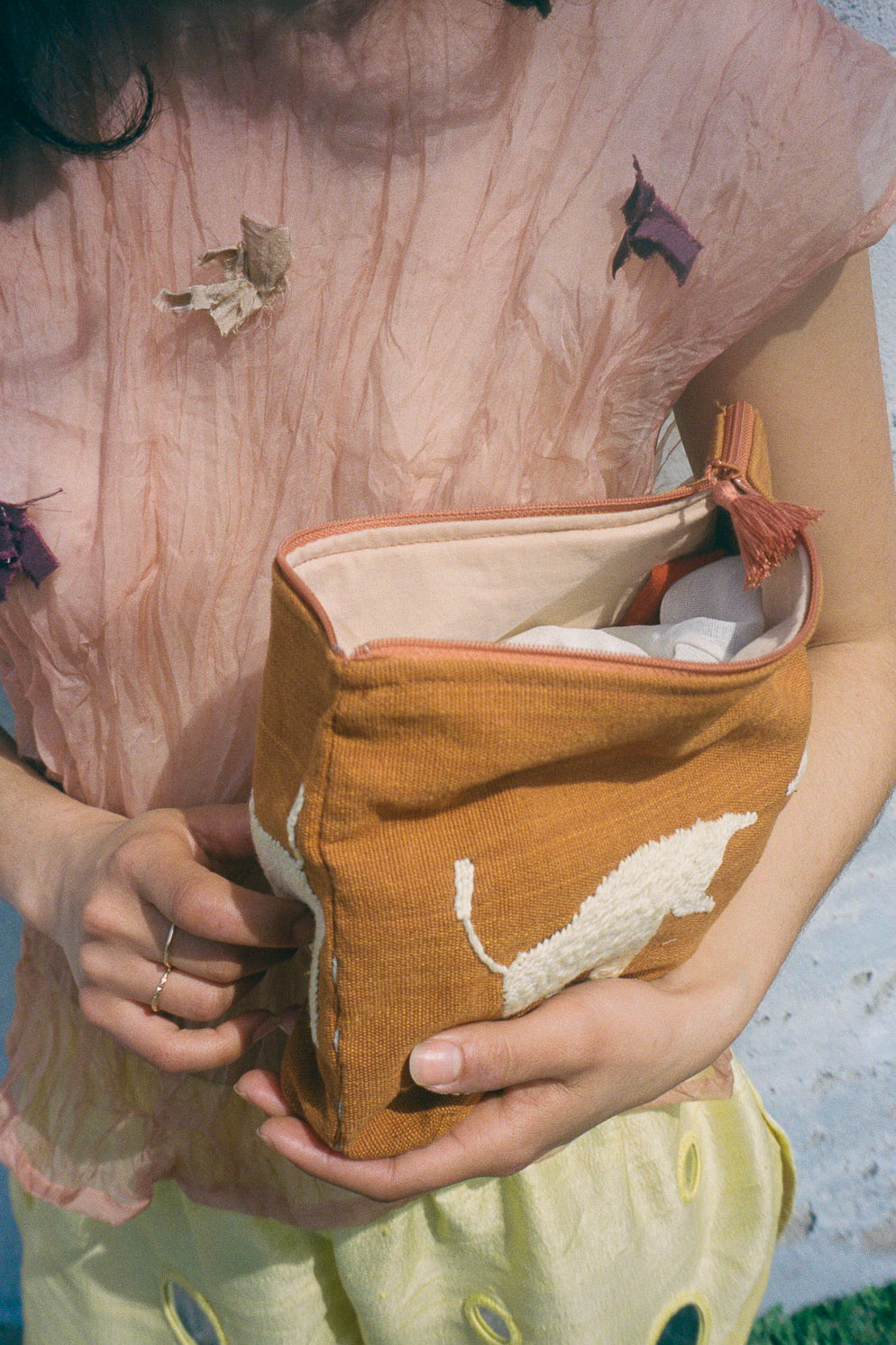 brown cotton animal embroidered handheld toiletry bag