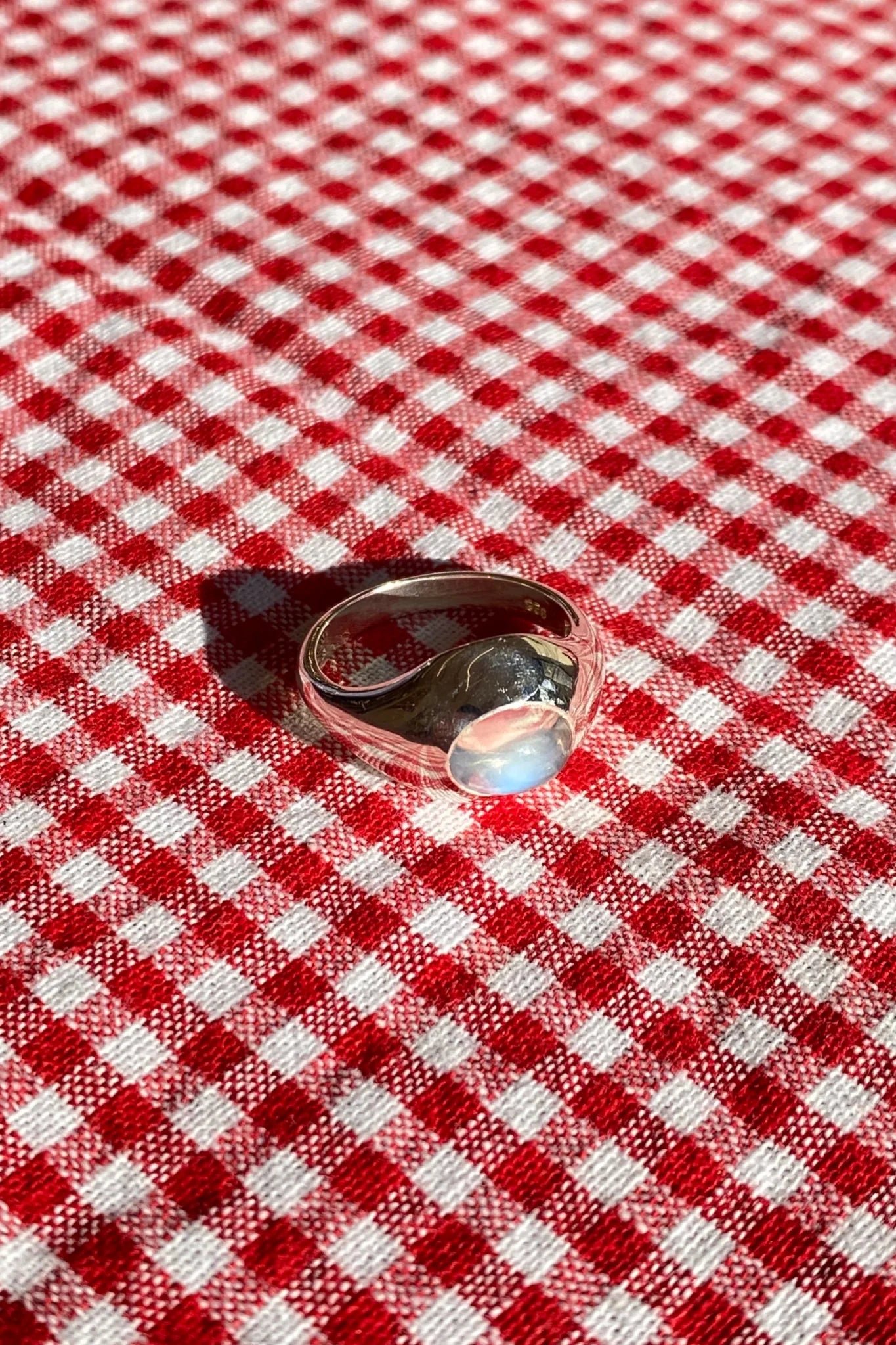 sterling silver ring set with a moonstone cabochon