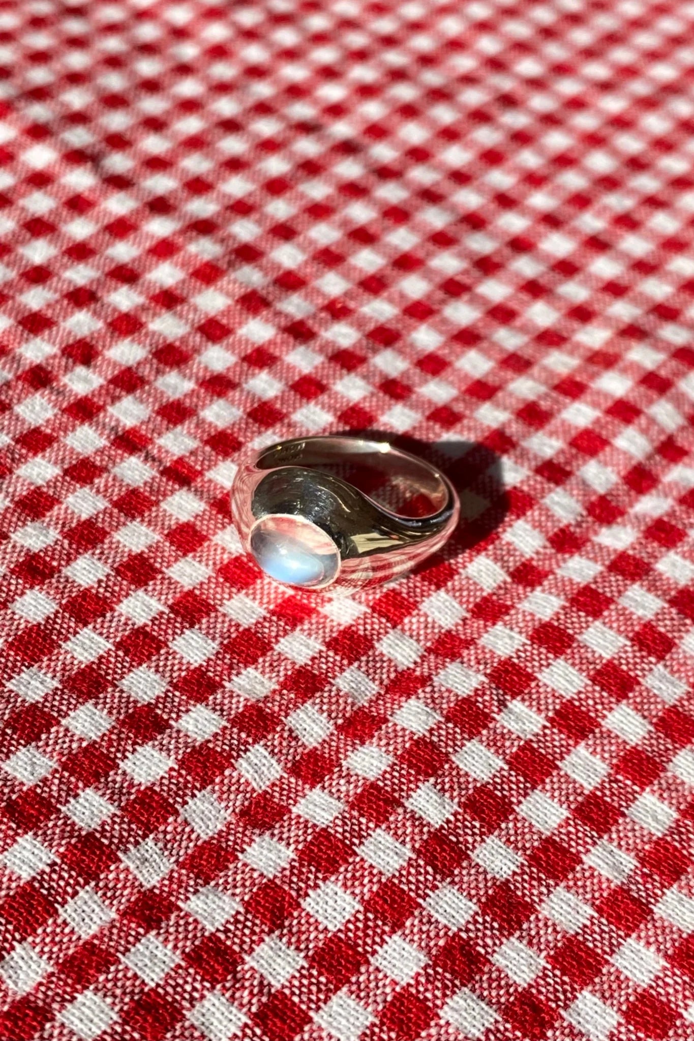 sterling silver ring set with a moonstone cabochon