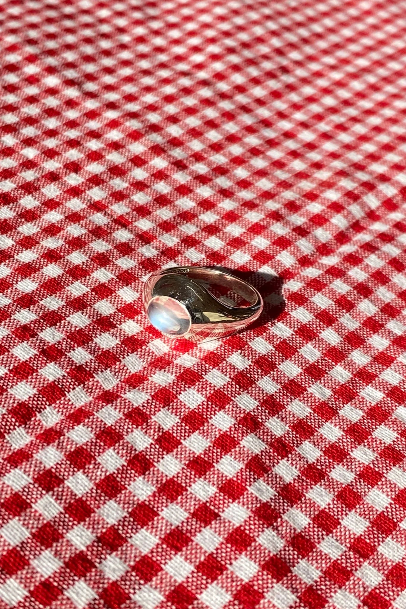 sterling silver ring set with a moonstone cabochon