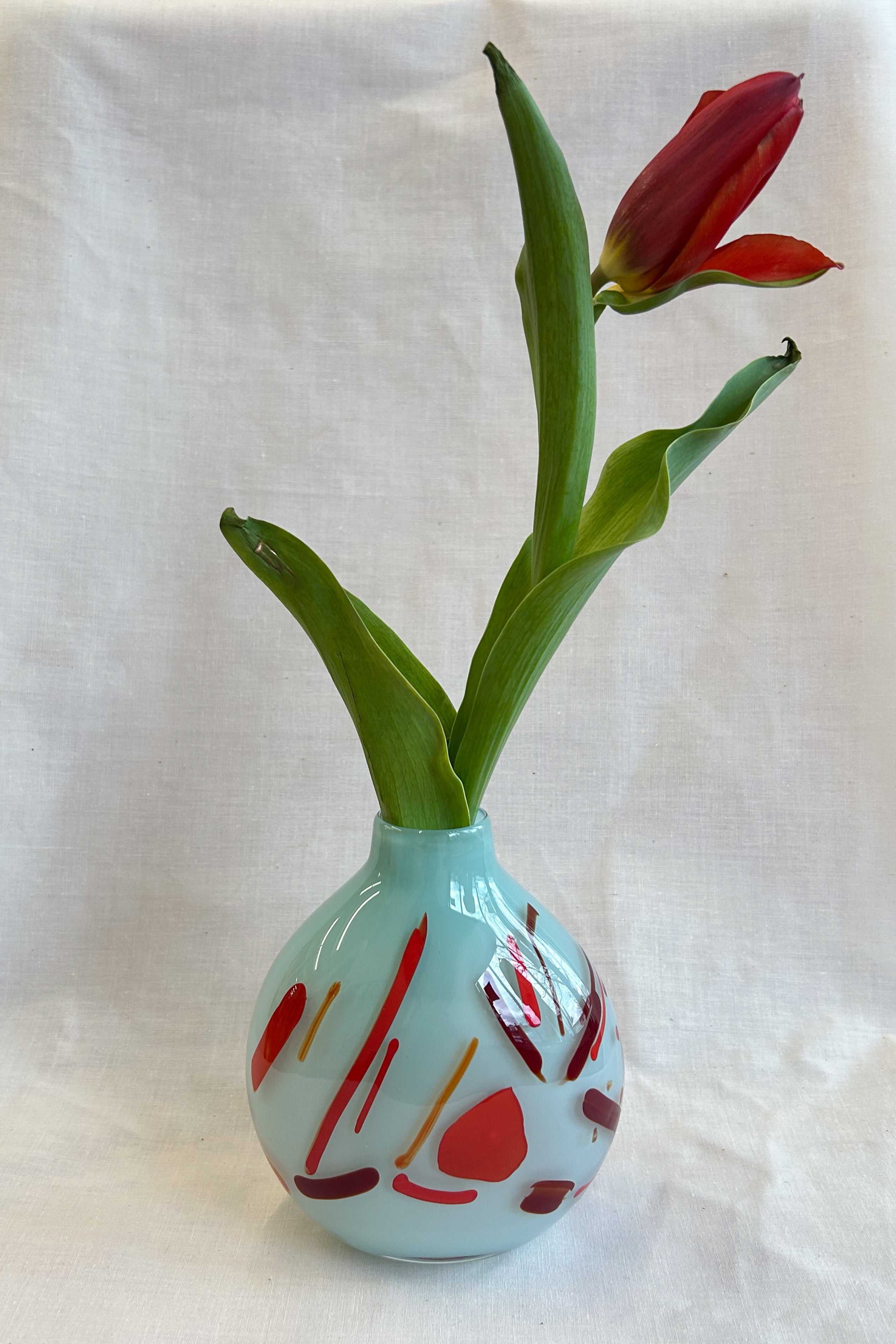 small vase with expressive strokes of colour pattern