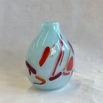 small vase with expressive strokes of colour pattern